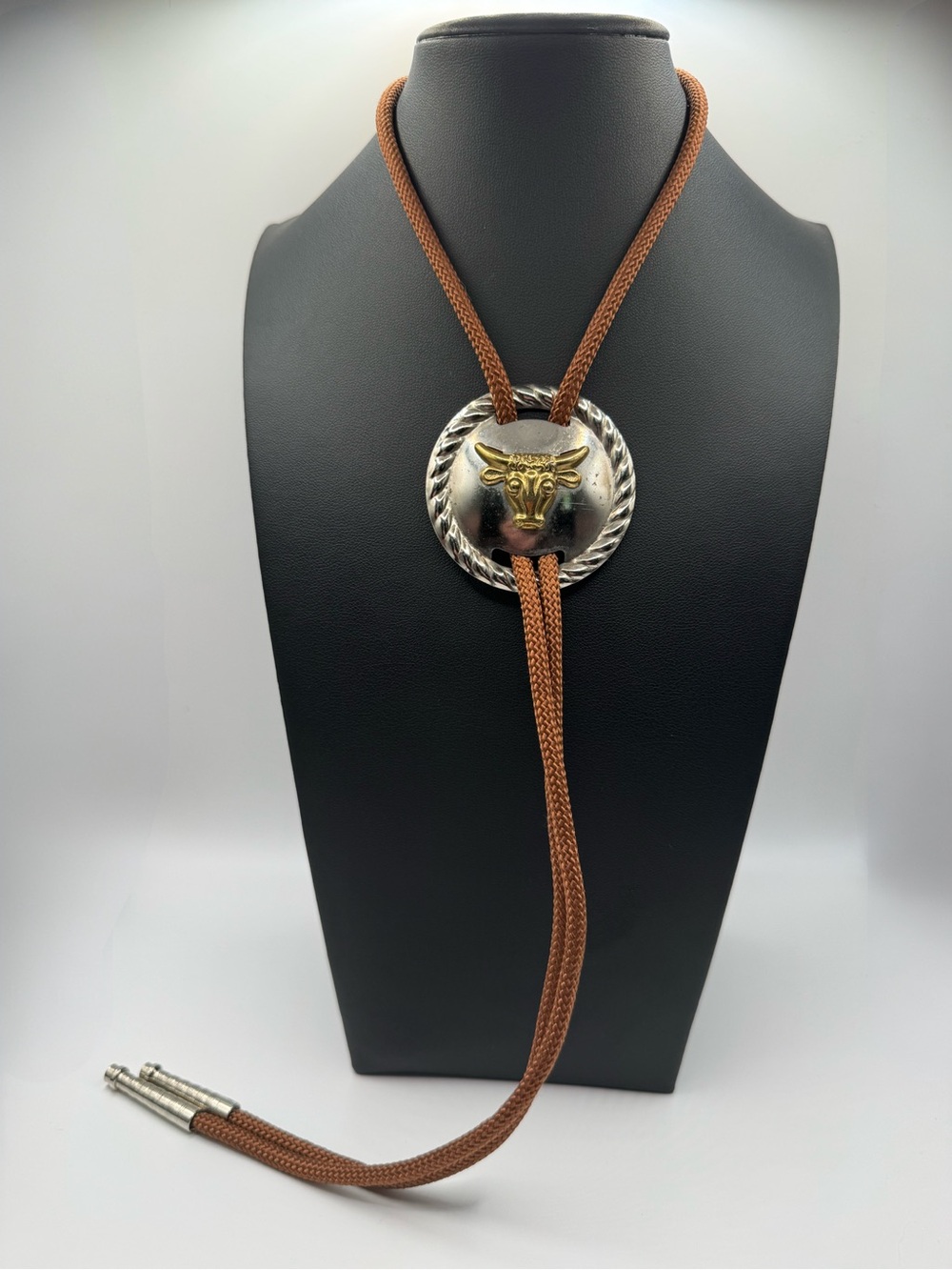 Braided Brown Bolo Tie with Silver-Tone Round Concho and Gold Bull Accent